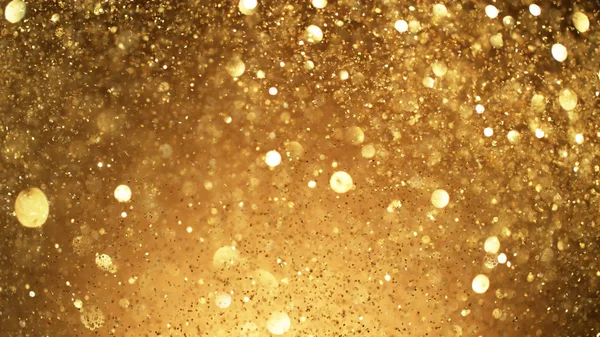 Abstract Gouden Glinsterende Achtergrond Met Wazige Stippen — Stockfoto