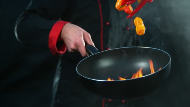 Super Slow Motion Falling Chilli Peppers Flames Filmed High Speed — Stock Video