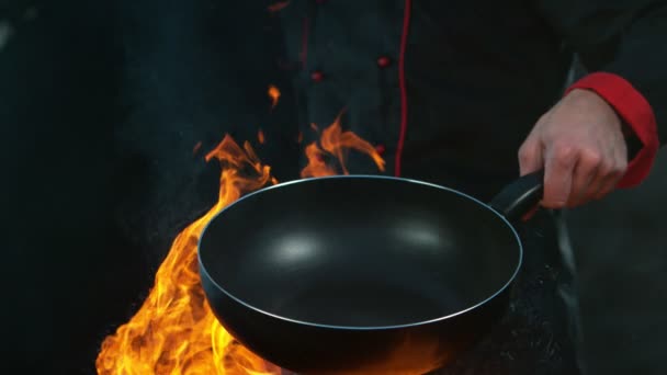 Super Slow Motion Chef Holding Empty Pan Flames Filmed High — Stock Video