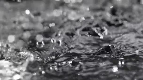 Super Slow Motion Splashing Water Isolated Black Background Filmed High — Stock Video