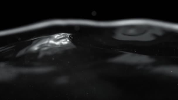 Super Slow Motion Splashing Water Isolated Black Background Filmed High — Stock Video