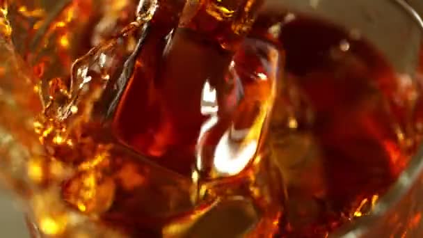 Super Slow Motion Pouring Whiskey Glass Super Macro Shot Filmed — Stock Video