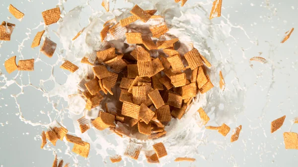 Freeze Motion Rotating Cereal Pieces Milk Splash Isolated White Background — Stock Photo, Image