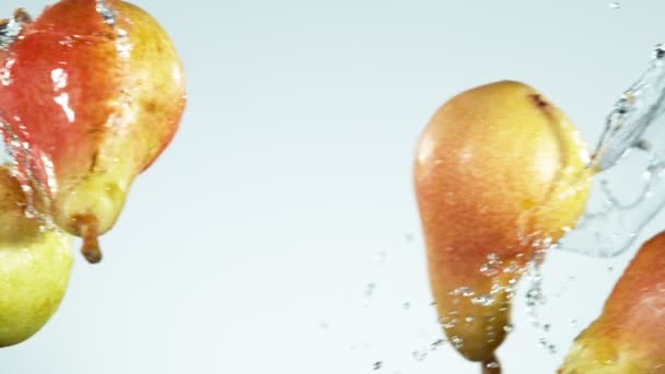 Super Slow Motion Pears Hitting Air Water Splashes Filmed High — Stock Video