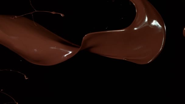 Super Cámara Lenta Colisión Salpicaduras Chocolate Caliente Sobre Fondo Negro — Vídeos de Stock