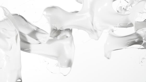 Super Slow Motion Flying Milk Splashes White Background Filmed High — Stock Video