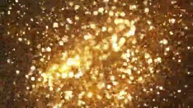 Siyah zemin üzerinde ışıldayan altın parçacıkların süper yavaş çekimi. Sığ odak derinliği. Yüksek hızlı sinema kamerası, 1000 fps..