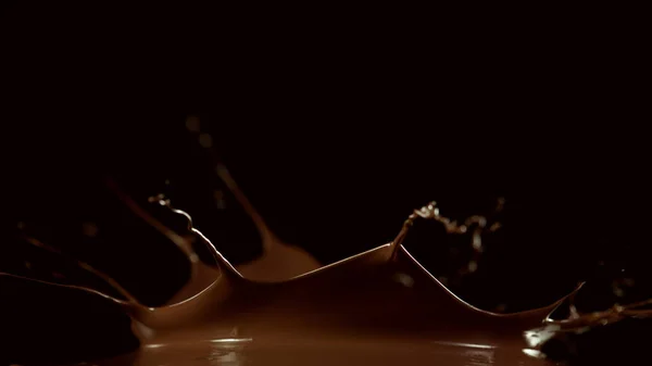 Abstrakte Form Der Spritzenden Heißen Schokolade Isoliert Auf Schwarzem Hintergrund — Stockfoto