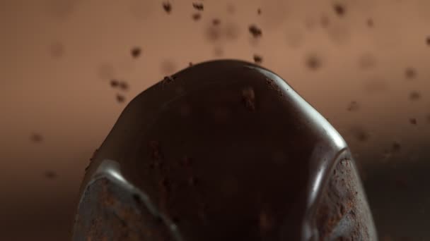 Super Slow Motion Falling Cocoa Powder Praline Bonbon Detail Filmed — Stock Video