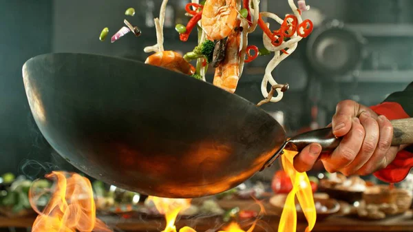 Freeze Motion Wok Pan Flying Ingredients Air Kitchen Background Stock Picture