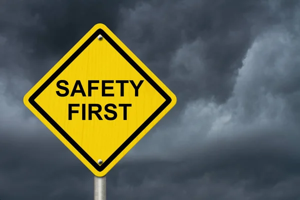 Safety First Warning Sign Yellow Warning Sign Words Safety First — Stock Photo, Image