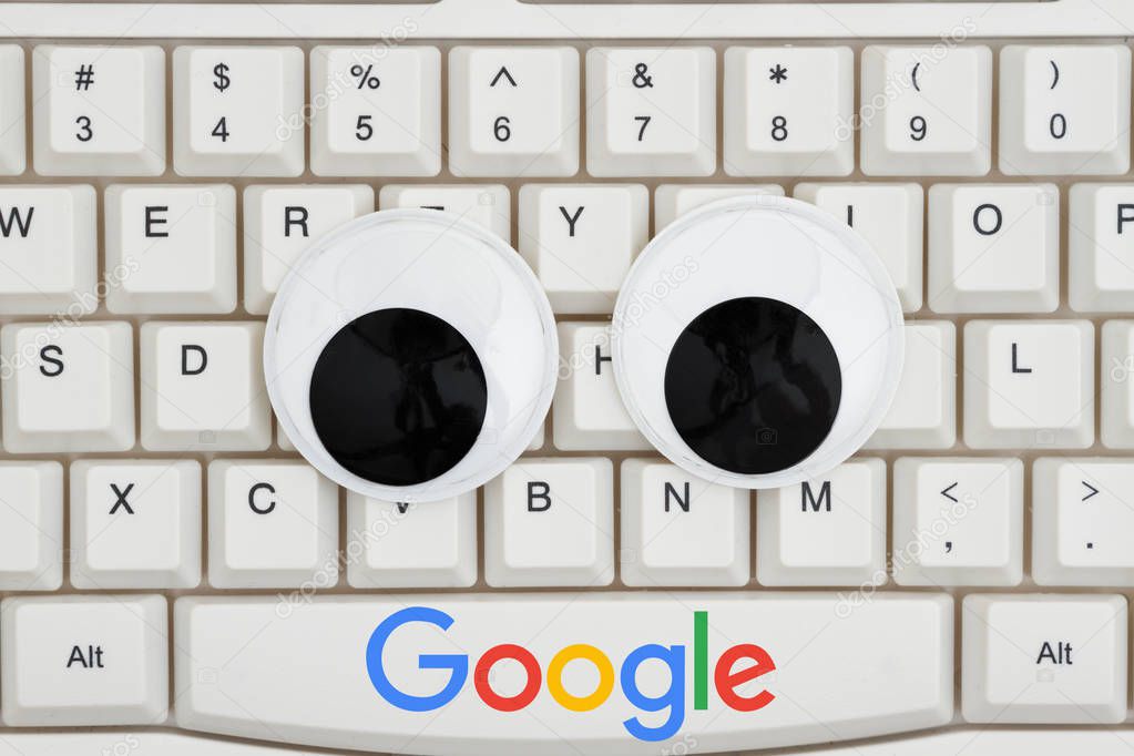 South Carolina, USA Oct 2018. Illustrative editorial image of googly eyes on a keyboard with the Google logo for searching on the Internet