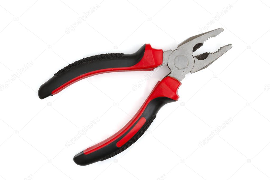 A black and red hand pliers isolated over white