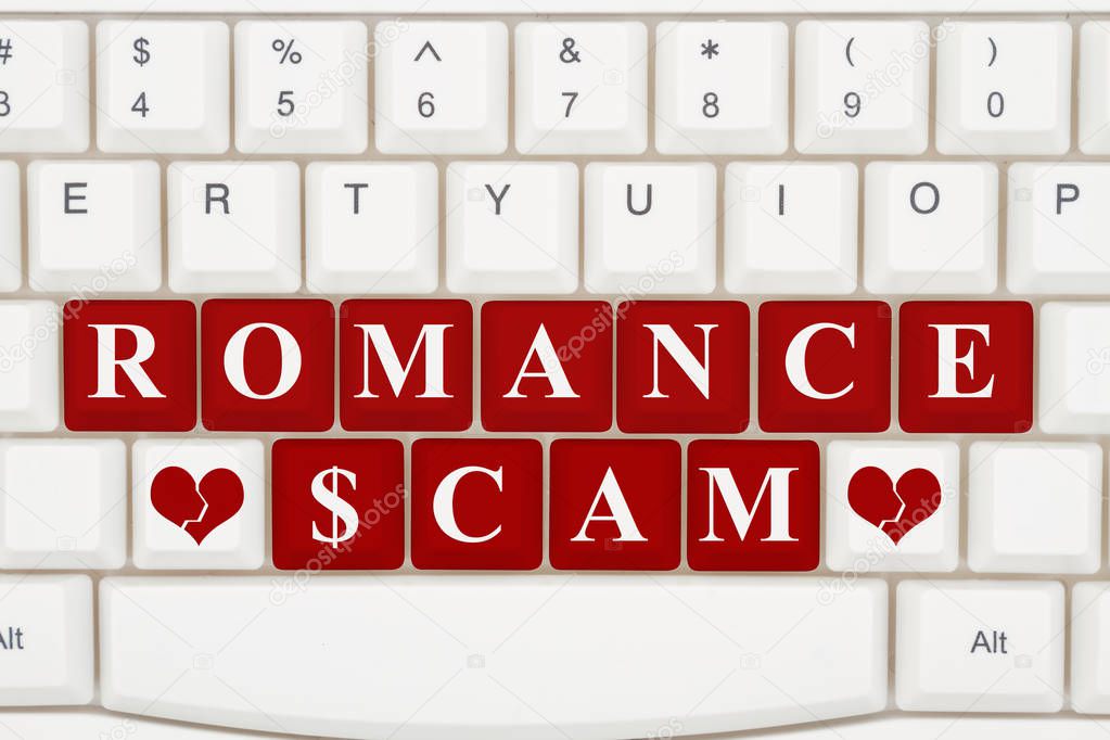 Dating scams on the internet, A close-up of a keyboard with red highlighted text Romance Scam