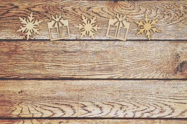 Houten Sneeuwvlokken Kerst Presenteert Een Verweerde Houten Achtergrond Die Kunt — Stockfoto