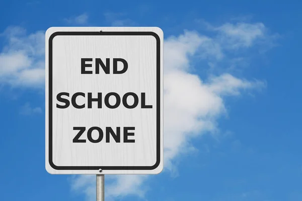 Black and white End School Zone Sign,White highway sign with text End School Zone with sky background