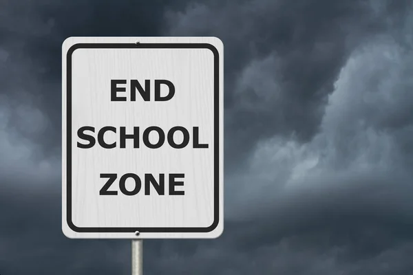 Black and white End School Zone Sign,White highway sign with text End School Zone with stormy sky background
