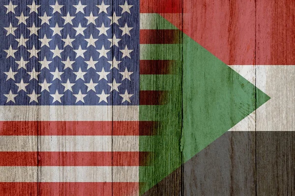 Relationship between the USA and Sudan, The flags of USA and Sudan merged on weathered wood