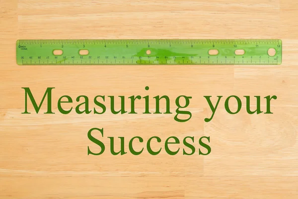 Measuring your Success message with a plastic ruler on a desk — Stock Photo, Image