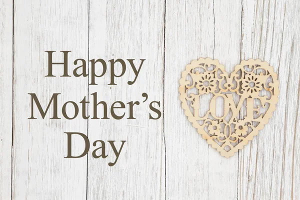 Happy Mother's Day greeting with wood heart on weathered wood — Stock Photo, Image