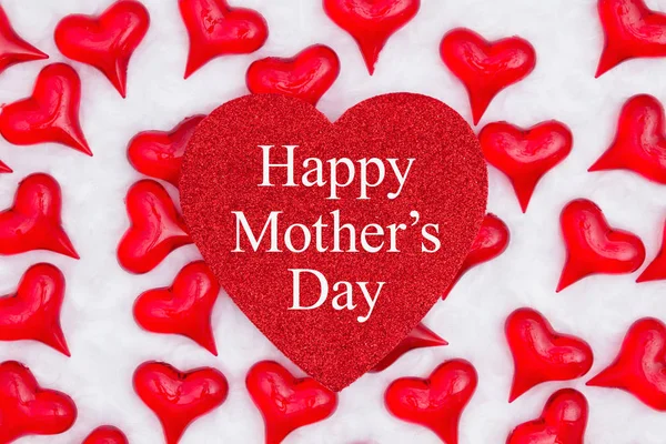 Happy Mother's Day greeting on glitter heart with red hearts on — Stock Photo, Image