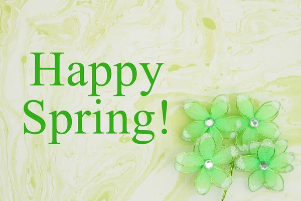 Happy Spring message with green flowers on green watercolor pape — Stock Photo, Image