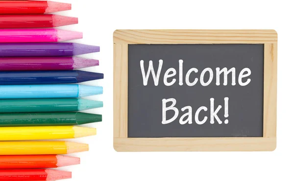 Welcome Back message on a chalkboard with colored watercolor pen — Stock Photo, Image