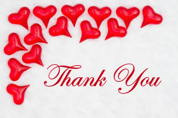 Thank you message with red hearts