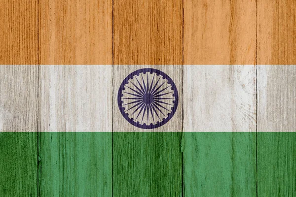 A rustic old Indian flag on weathered wood — Stock Photo, Image