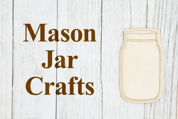 Mason jar artisanat texte avec un bocal de maçon en bois sur bois altéré — Photo