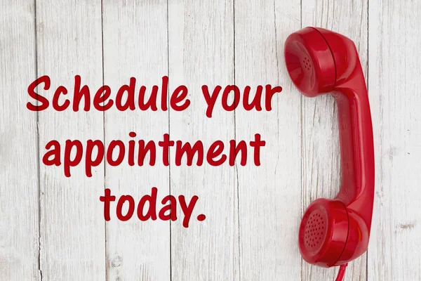 Schedule your appointment today text with retro red phone handse — Stock Photo, Image