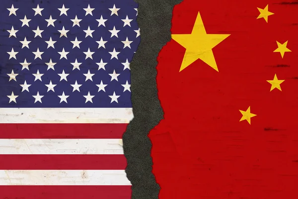 American and Chinese flags that are torn apart — Stock Photo, Image