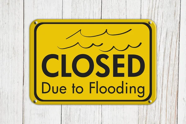 Closed Due to Flooding sign