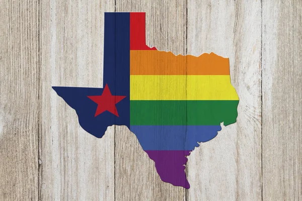 Una vieja bandera rústica del orgullo de Texas con mapa estatal en madera envejecida —  Fotos de Stock