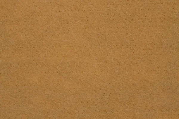 Light brown textured felt fabric material background — Stock Photo, Image