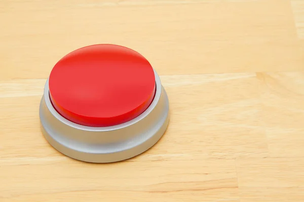 A blank red push button on a wooden desk — Stock Photo, Image