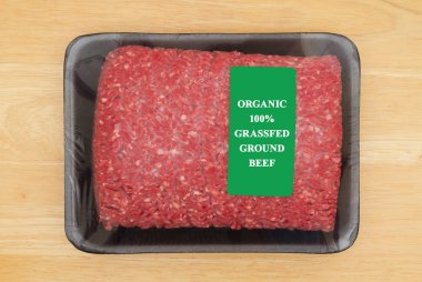 Two pounds of organic grassfed ground beef in package clipart