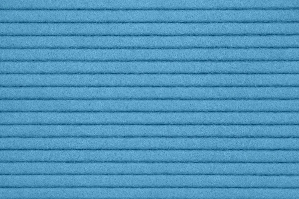 Blu strutturato linee scanalate feltro tessuto materiale sfondo — Foto Stock