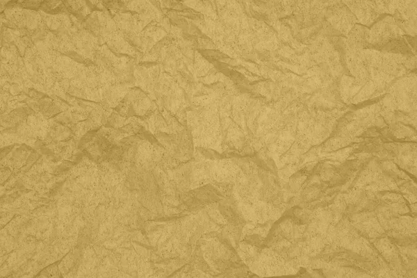Guld texturerat rynkigt papper material bakgrund — Stockfoto