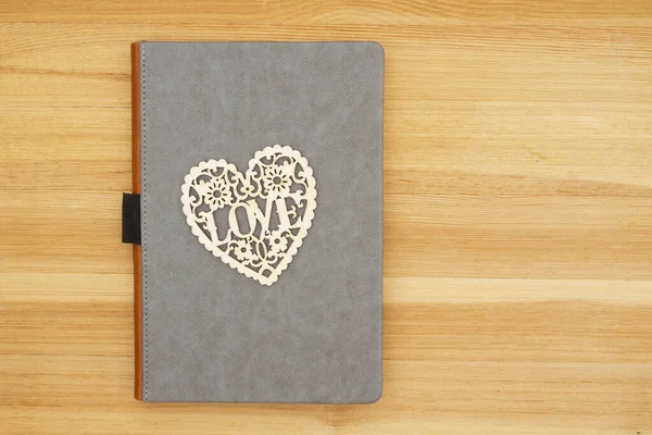 Blank gray leather book with heart — Stock Photo, Image