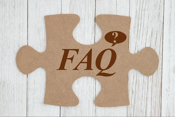 Faq-Nachricht auf braunem Karton Puzzleteil — Stockfoto