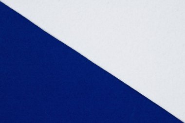 Çapraz olarak bölünmüş mavi ve beyaz keçeli malzeme arka planı