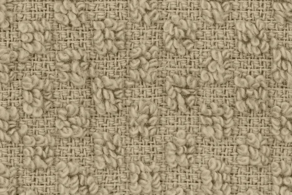 Brown knit textured weave material background with copy space for message or use as a texture