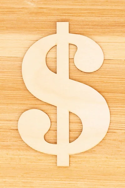 Nahaufnahme Eines Unfertigen Hellen Holz Dollarzeichens Auf Einem Holztisch — Stockfoto