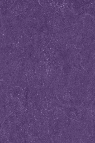 Purple textured cardstock paper closeup background with copy space for message or use as a texture
