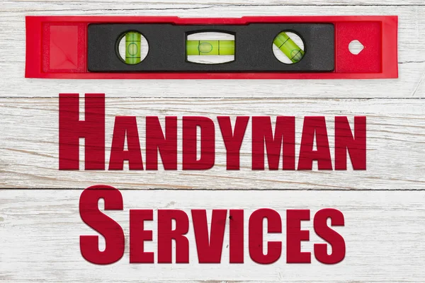 Handyman Services Word Message Red Black Level Distressed Whitewash Stock Photo