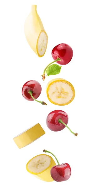Isolerade Flygande Frukter Fallande Banan Och Körsbär Frukt Isolerad Vit — Stockfoto
