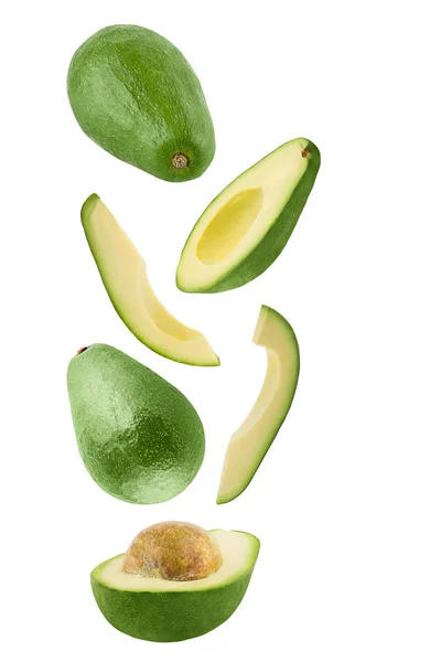 İzole uçan avokado. Paket tasarım öğesi ve reklam izole kırpma yolu beyaz zemin üzerine düşen taze avokado.