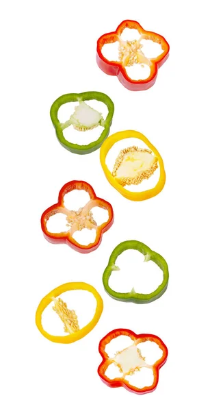 Falling sliced sweet pepper isolated on white background — Stock Photo, Image