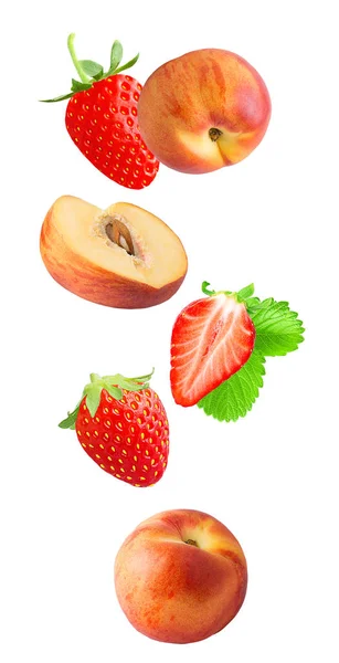 Falling fresh berriy and peaches isolated on white background — Stock Photo, Image